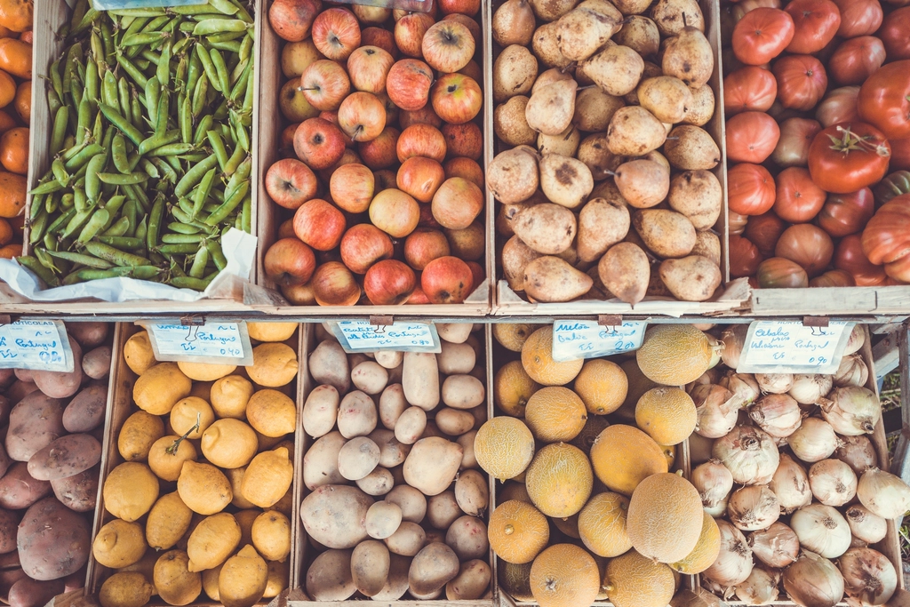 Baskets potatoes, beans, and tomatoes