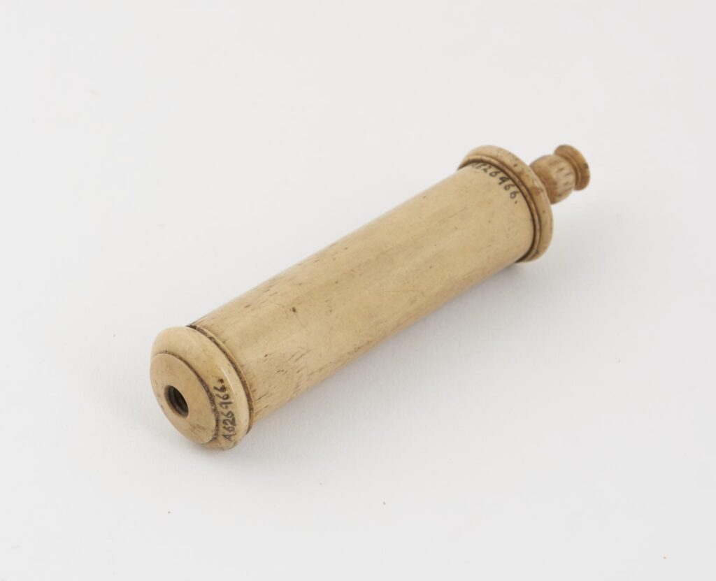 Ebonite piston-action syringe by the I.R. Comb Comapny