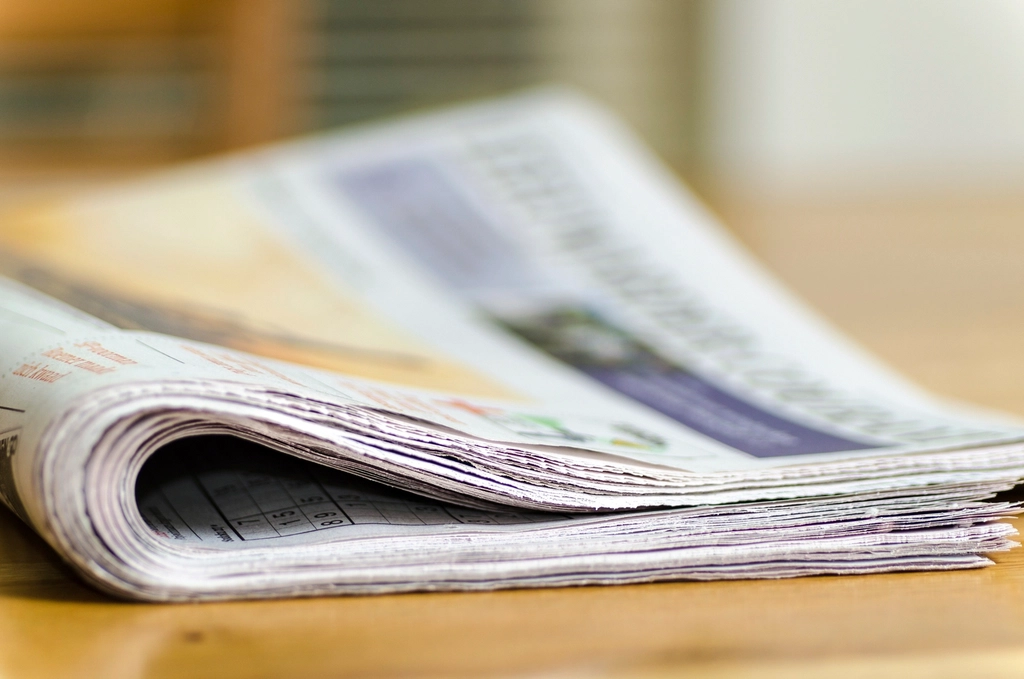 Free newspaper table closeup image